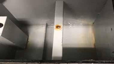 Indoor grease trap cleaning and repair. 